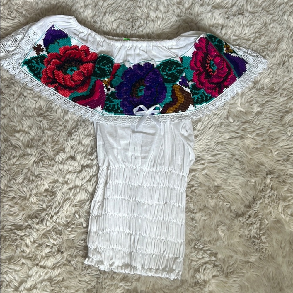 Hand stitched off shoulder blouse
